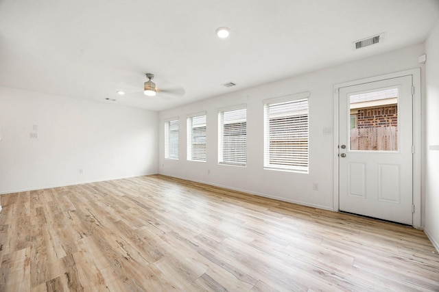 4307 Palmetto Grove Ln, Baytown, TX 77521 - unfurnished room with a ceiling fan, light wood-style flooring, recessed lighting, and baseboards