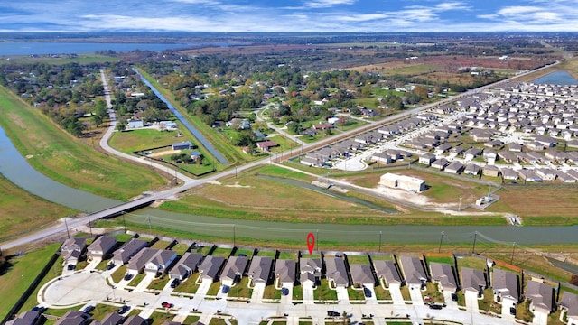 4307 Palmetto Grove Ln, Baytown, TX 77521 - aerial overview of property's location with nearby suburban area and a nearby body of water