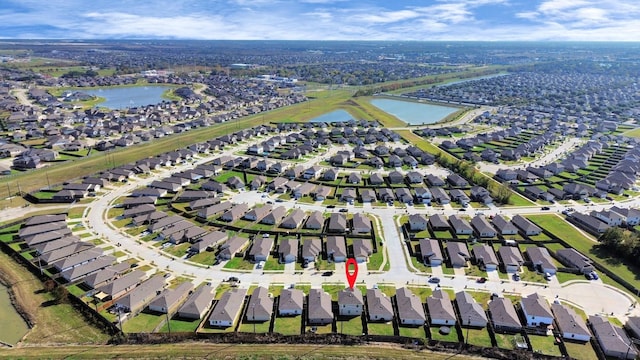 4307 Palmetto Grove Ln, Baytown, TX 77521 - aerial overview of property's location featuring a nearby body of water and nearby suburban area