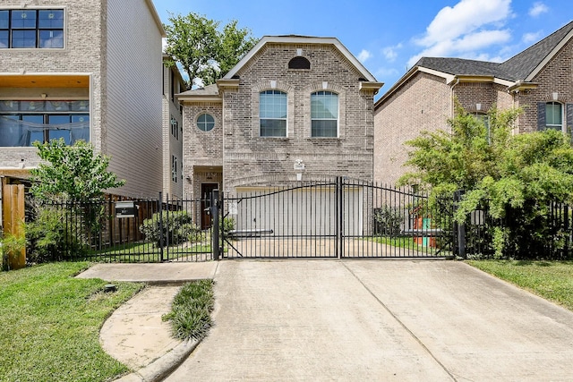 7608 Janak Dr, Houston, TX 77055 - french country style house with brick siding, a gate, and driveway