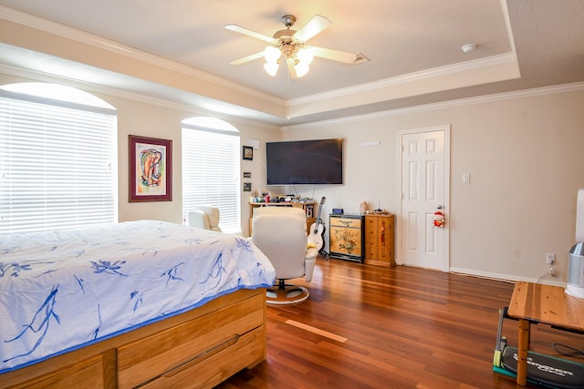 7608 Janak Dr, Houston, TX 77055 - bedroom with a raised ceiling, wood finished floors, ornamental molding, baseboards, and a ceiling fan