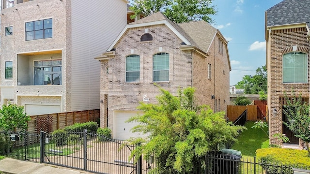 7608 Janak Dr, Houston, TX 77055 - view of side of home with brick siding and an attached garage