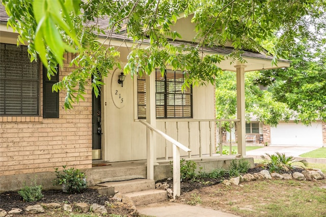 215 Edward Ln, Brenham, TX 77833 - property entrance with brick siding and covered porch