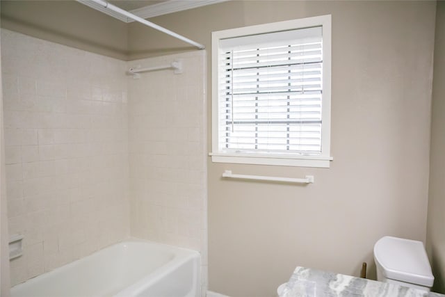 215 Edward Ln, Brenham, TX 77833 - full bathroom featuring toilet, shower / washtub combination, and crown molding