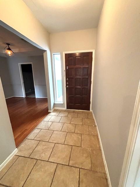 3407 S Briar Knoll Dr, Houston, TX 77082 - entryway featuring baseboards