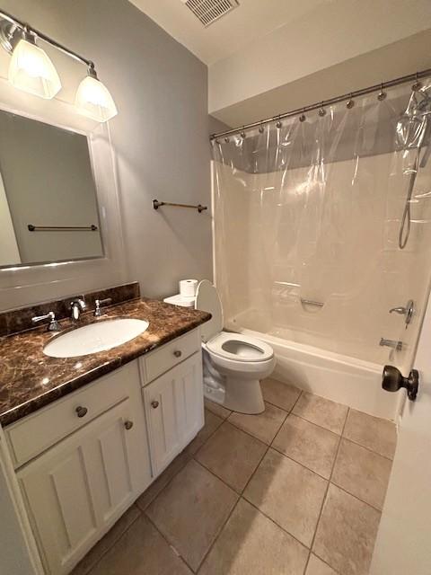 3407 S Briar Knoll Dr, Houston, TX 77082 - full bath featuring tile patterned flooring, shower / bath combination with curtain, vanity, and toilet