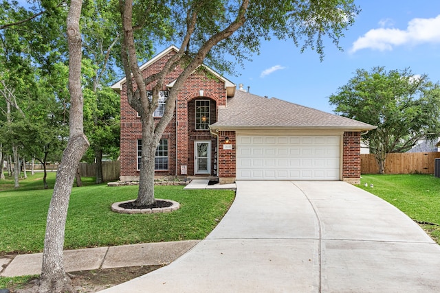 13617 Jasmine Creek Ln, Rosharon, TX 77583 - traditional-style home with driveway, an attached garage, brick siding, and a shingled roof