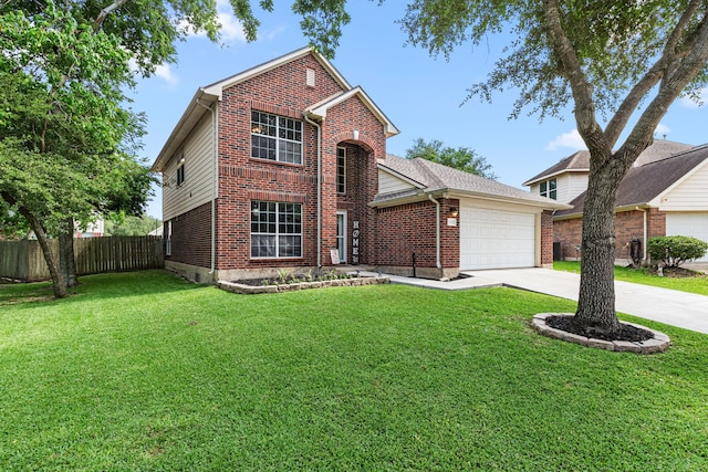 13617 Jasmine Creek Ln, Rosharon, TX 77583 - traditional home with brick siding, a garage, and driveway