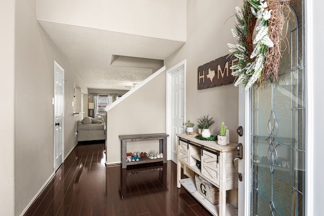 13617 Jasmine Creek Ln, Rosharon, TX 77583 - entryway featuring baseboards, wood finished floors, and stairway