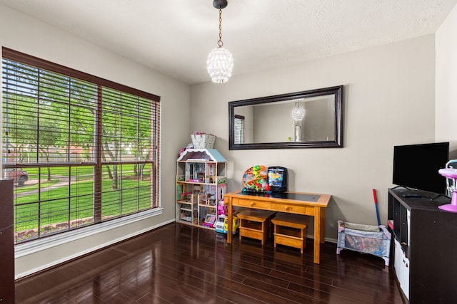 13617 Jasmine Creek Ln, Rosharon, TX 77583 - recreation room with baseboards, wood finished floors, and a chandelier