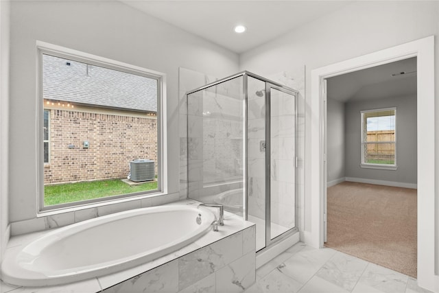 231 Upland Dr, Waller, TX 77484 - bathroom with a shower stall, a bath, baseboards, marble finish floors, and recessed lighting