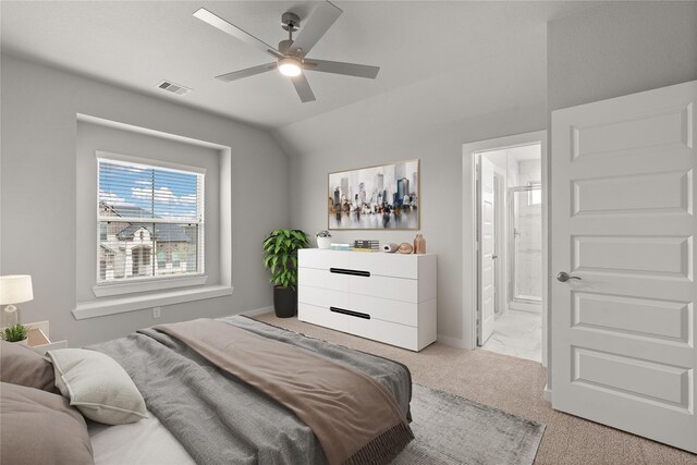 231 Upland Dr, Waller, TX 77484 - carpeted bedroom featuring connected bathroom, baseboards, and a ceiling fan