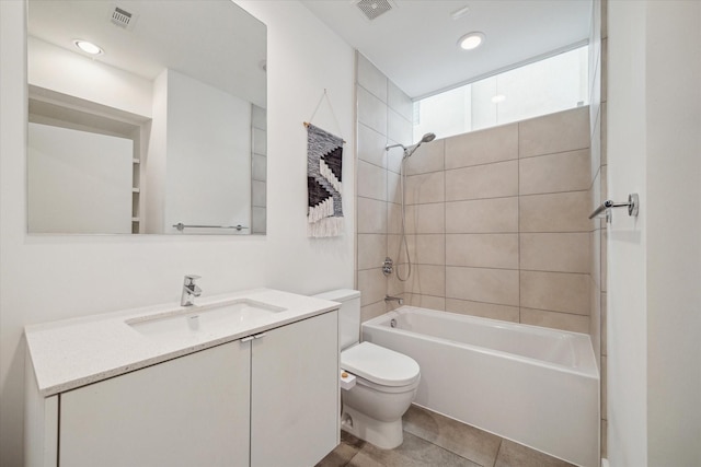 4812 Chenevert St Unit A, Houston, TX 77004 - full bath with toilet, tub / shower combination, vanity, tile patterned floors, and recessed lighting