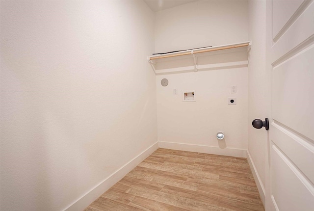 5714 Pershing St A/B, Unit A/B Houston, TX 77033 - laundry area with electric dryer hookup, light wood finished floors, hookup for a washing machine, and baseboards