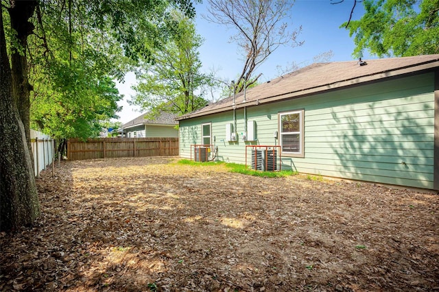 5714 Pershing St A/B, Unit A/B Houston, TX 77033 - rear view of property featuring a fenced backyard and cooling unit