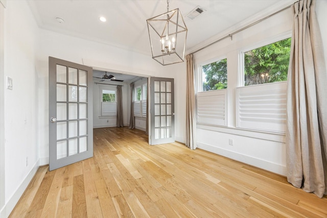 507 W 12th St, Houston, TX 77008 - unfurnished dining area with light wood finished floors, french doors, baseboards, and recessed lighting