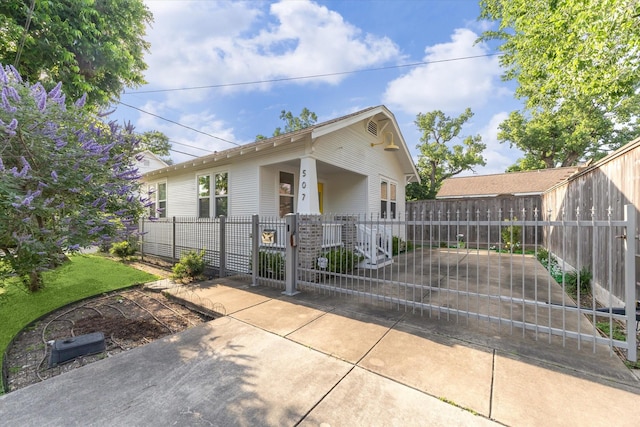 507 W 12th St, Houston, TX 77008 - view of front of house featuring a fenced front yard and a gate