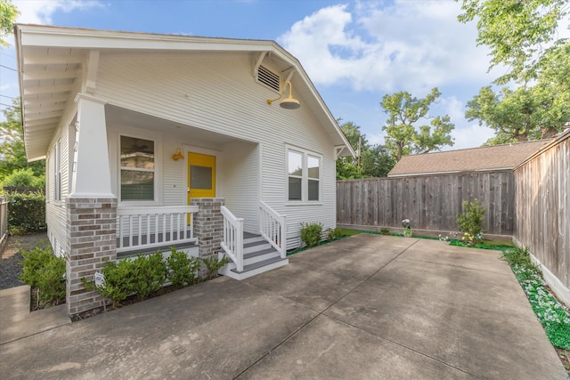 507 W 12th St, Houston, TX 77008 - view of front of house featuring a fenced backyard and a patio area