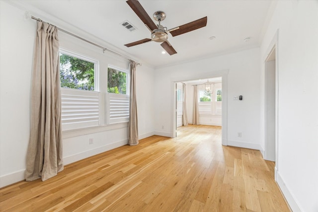 507 W 12th St, Houston, TX 77008 - unfurnished room with ceiling fan, light wood finished floors, and baseboards