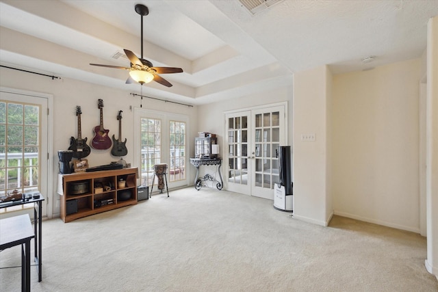 2326 Pin Hook Ct, Seabrook, TX 77586 - sitting room featuring french doors, carpet floors, ceiling fan, a tray ceiling, and baseboards