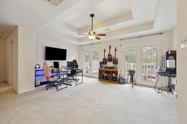 2326 Pin Hook Ct, Seabrook, TX 77586 - carpeted office featuring french doors, a tray ceiling, a ceiling fan, baseboards, and attic access