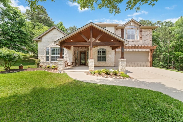 2260 Teas Crossing Dr, Conroe, TX 77304 - view of front of property with stone siding, a garage, driveway, a front lawn, and a porch