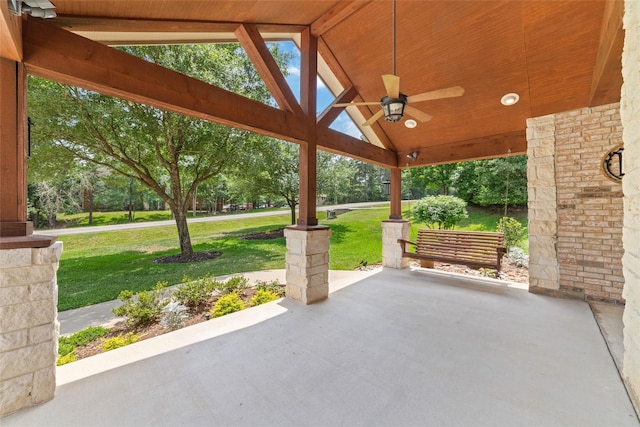 2260 Teas Crossing Dr, Conroe, TX 77304 - view of patio featuring ceiling fan and view of scattered trees
