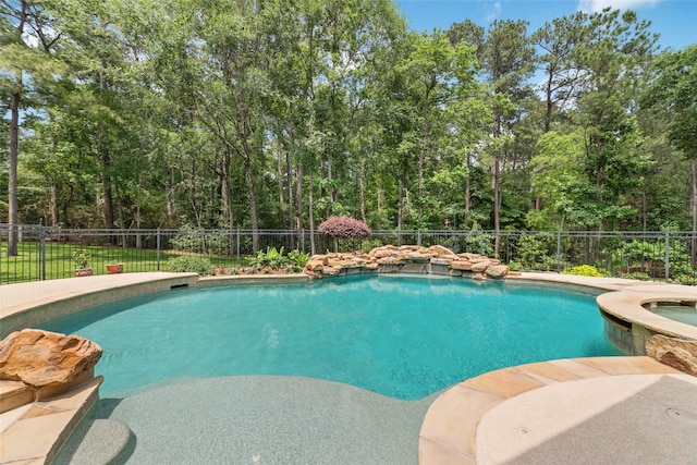 2260 Teas Crossing Dr, Conroe, TX 77304 - view of pool featuring a pool with connected hot tub