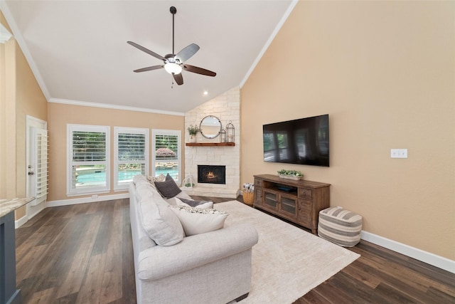 2260 Teas Crossing Dr, Conroe, TX 77304 - living room with ornamental molding, vaulted ceiling, ceiling fan, dark wood finished floors, and a fireplace