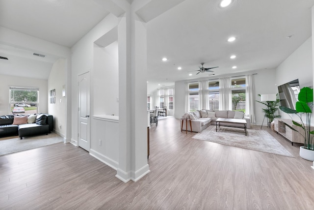 25219 Easton Ramsey Way, Richmond, TX 77406 - living area featuring a ceiling fan, wood finished floors, recessed lighting, and baseboards