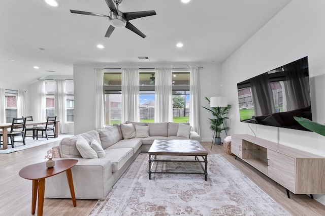 25219 Easton Ramsey Way, Richmond, TX 77406 - living area with recessed lighting, light wood finished floors, and a ceiling fan