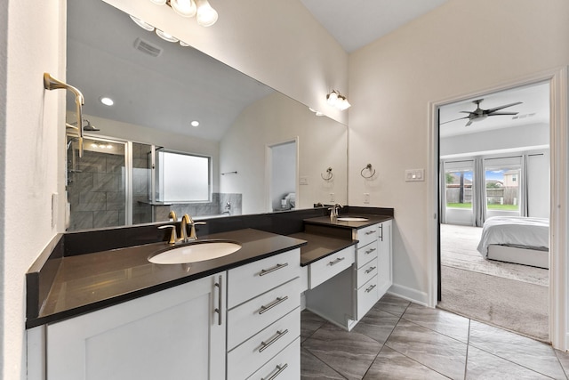 25219 Easton Ramsey Way, Richmond, TX 77406 - bathroom featuring double vanity, ensuite bath, a stall shower, ceiling fan, and baseboards