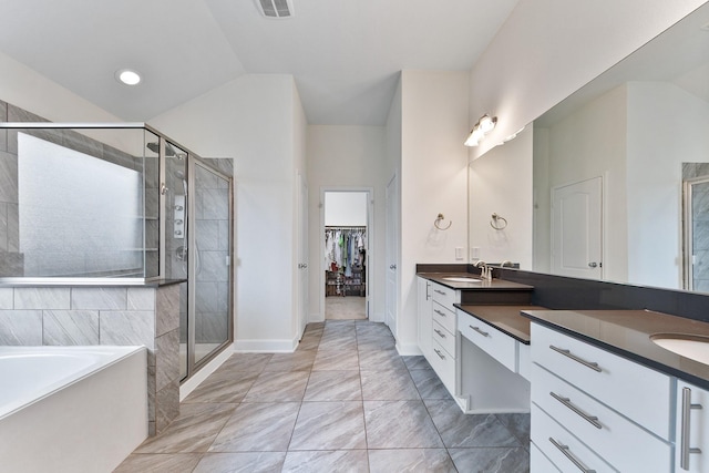 25219 Easton Ramsey Way, Richmond, TX 77406 - bathroom featuring a stall shower, vanity, a bath, and a walk in closet