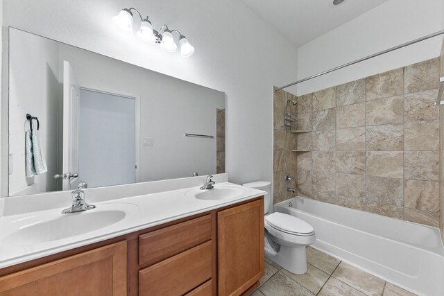 25219 Easton Ramsey Way, Richmond, TX 77406 - full bathroom with tub / shower combination, toilet, double vanity, and tile patterned floors