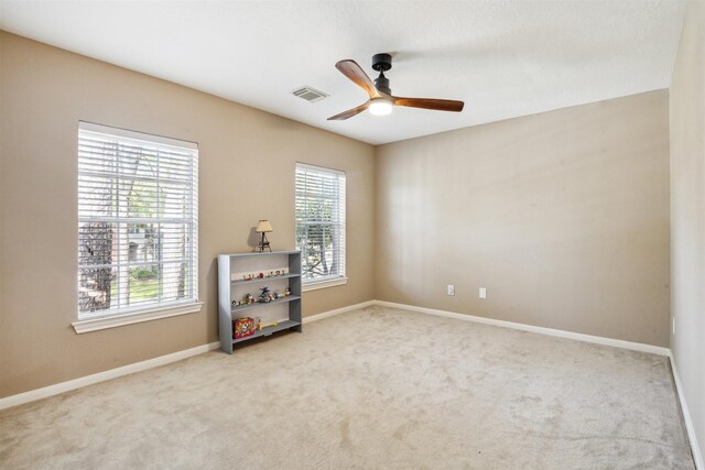 3919 Park Circle Way, Houston, TX 77059 - spare room featuring a ceiling fan, carpet flooring, and baseboards