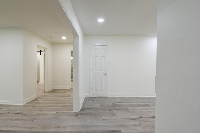527 Fm 787th Rd E, Cleveland, TX 77327 - hallway featuring wood finished floors, recessed lighting, and baseboards