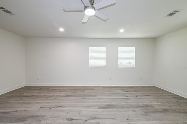 527 Fm 787th Rd E, Cleveland, TX 77327 - empty room featuring light wood finished floors, recessed lighting, baseboards, and a ceiling fan