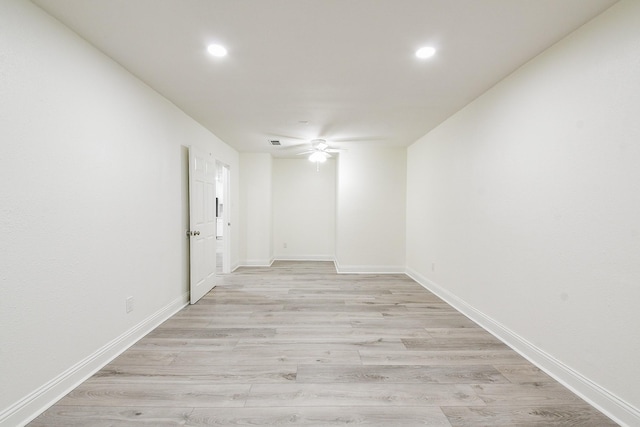 527 Fm 787th Rd E, Cleveland, TX 77327 - unfurnished room with light wood finished floors, ceiling fan, recessed lighting, and baseboards