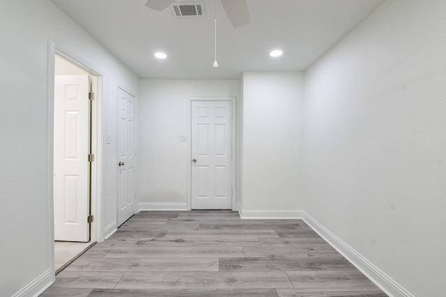 527 Fm 787th Rd E, Cleveland, TX 77327 - hall with recessed lighting, baseboards, and light wood-style flooring