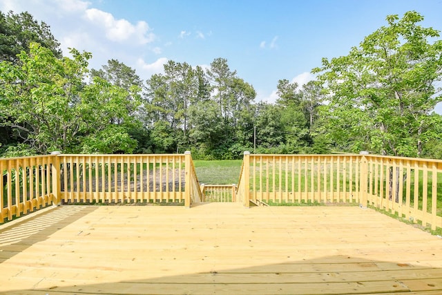 527 Fm 787th Rd E, Cleveland, TX 77327 - deck featuring view of scattered trees