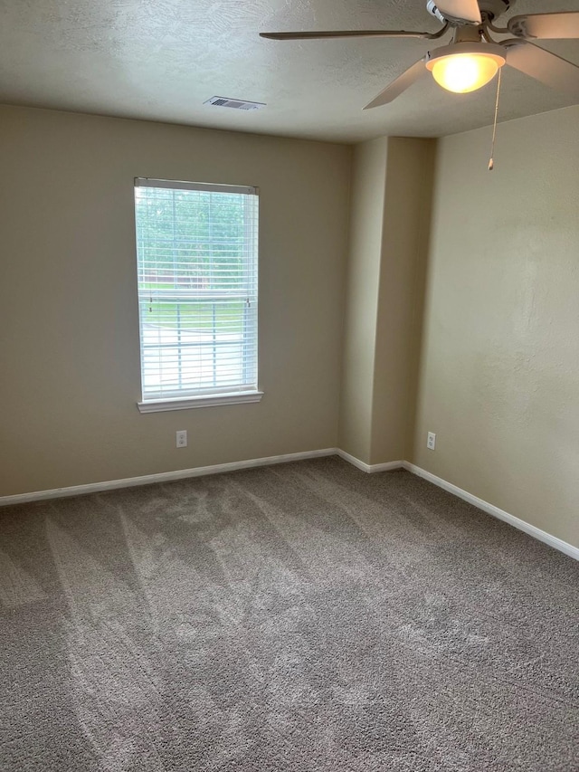 16127 Port O Call St, Crosby, TX 77532 - carpeted empty room with ceiling fan, baseboards, and a textured ceiling