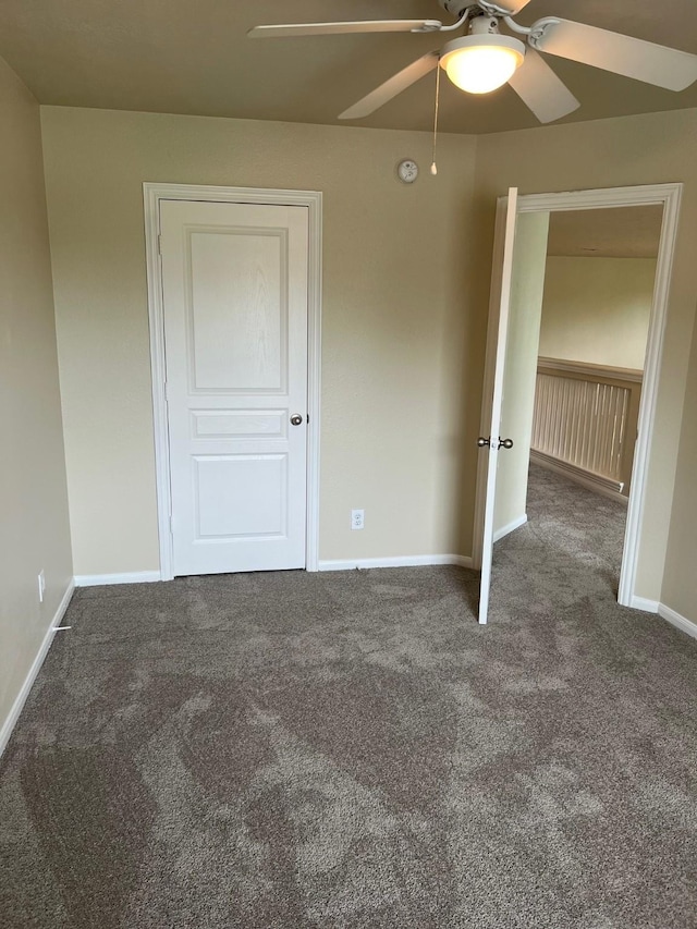 16127 Port O Call St, Crosby, TX 77532 - unfurnished bedroom with carpet flooring, baseboards, and ceiling fan
