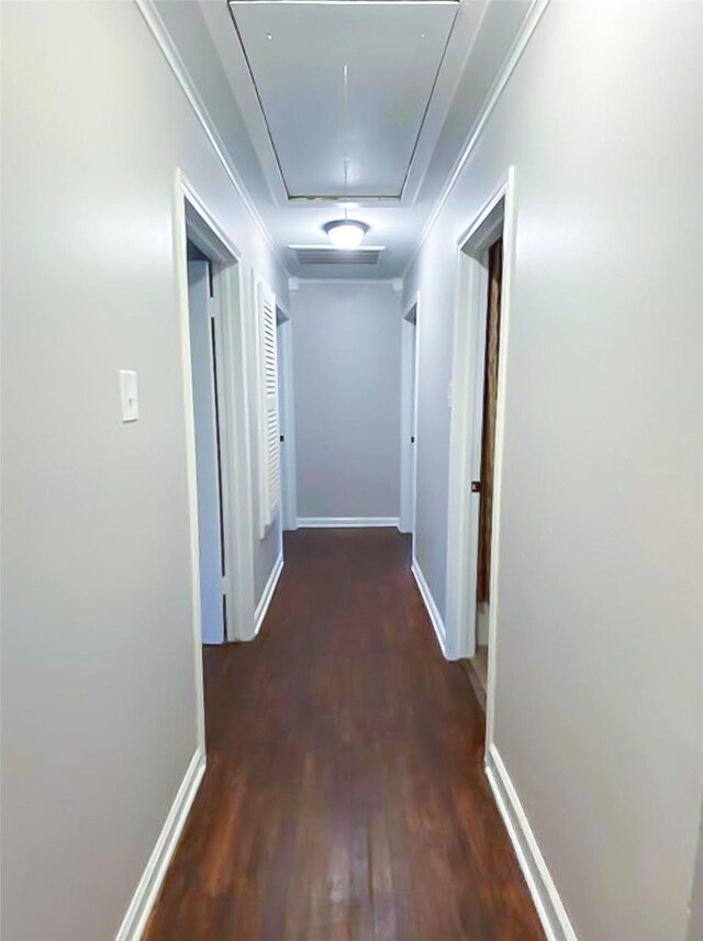 717 Grantham Rd, Baytown, TX 77521 - hall featuring attic access, wood finished floors, baseboards, and ornamental molding