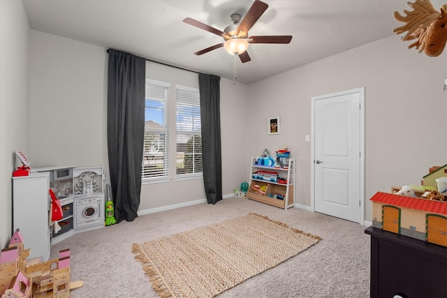 2221 Hay Field Ct, Conroe, TX 77384 - game room featuring carpet floors, a ceiling fan, and baseboards
