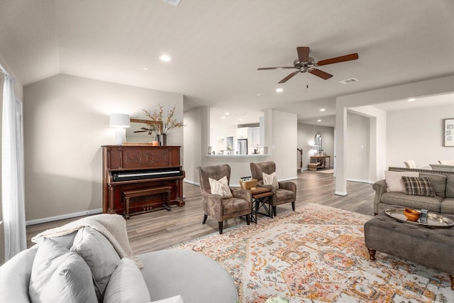 2221 Hay Field Ct, Conroe, TX 77384 - living room featuring ceiling fan, baseboards, light wood-style flooring, recessed lighting, and vaulted ceiling