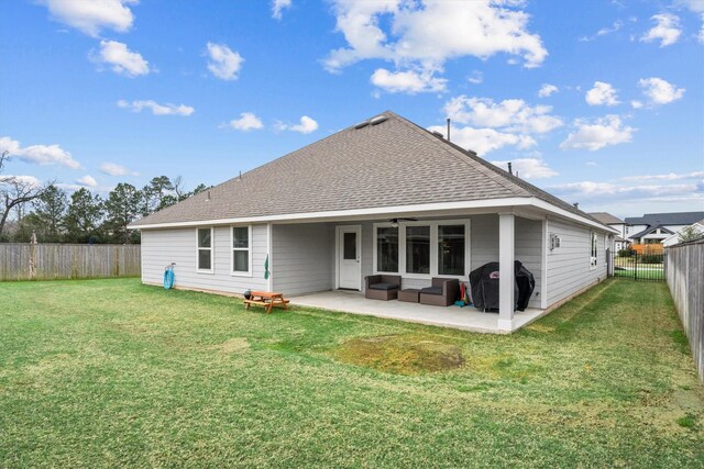 2221 Hay Field Ct, Conroe, TX 77384 - back of house featuring a patio, a shingled roof, an outdoor hangout area, and a ceiling fan