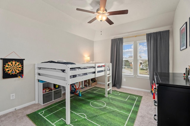 2221 Hay Field Ct, Conroe, TX 77384 - carpeted bedroom with baseboards, lofted ceiling, and ceiling fan