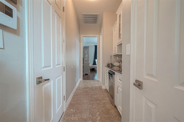 8807 Stones Throw Ln, Missouri City, TX 77459 - hall featuring baseboards and stone finish floors