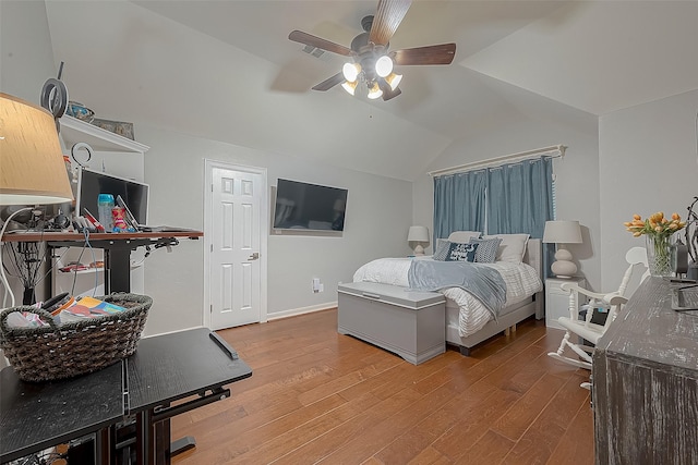8807 Stones Throw Ln, Missouri City, TX 77459 - bedroom with lofted ceiling, light wood-type flooring, ceiling fan, and baseboards