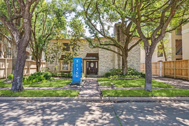 5135 Edloe St, Houston, TX 77005 - multi unit property featuring brick siding, a chimney, and stone siding